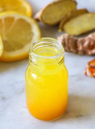 Close,Up,Of,A,Healthy,Ginger,Lemon,Turmeric,Shot,Â